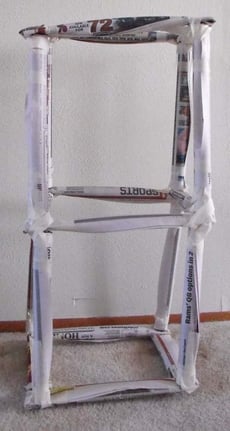 Test the Stability of Newspaper Towers