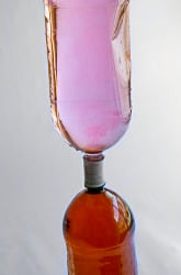 Magma Lamp: What Happens When a Less-Dense Fluid Interacts with a Denser One?