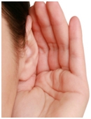 In this sound experiment children listen for differences as they tap on a bag of air, a bag of water, and a wooden block held up to their ears.