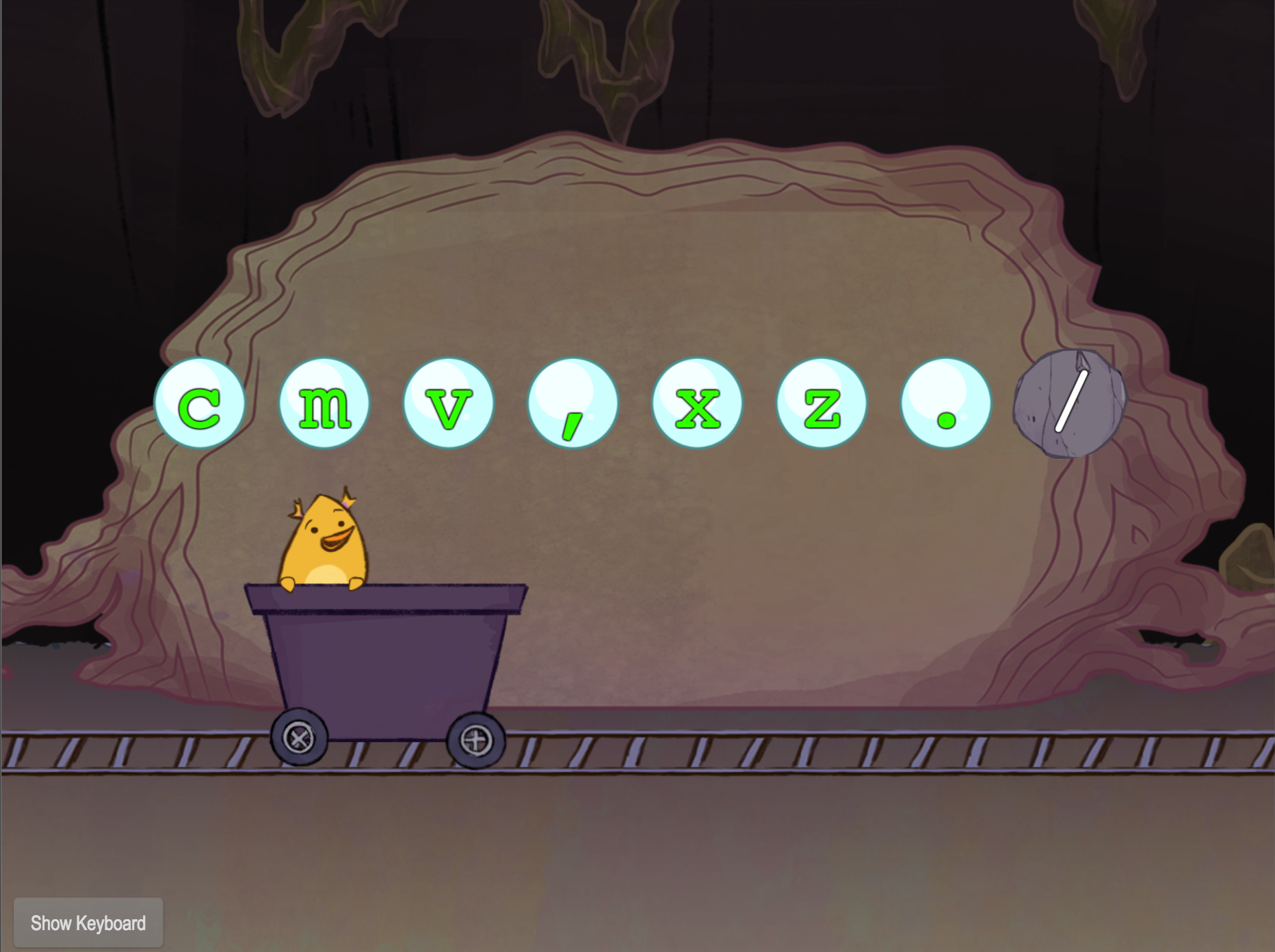 Bottom Row Typing: V-M-C-X-Z-Comma-Period-Slash with Gem Miner